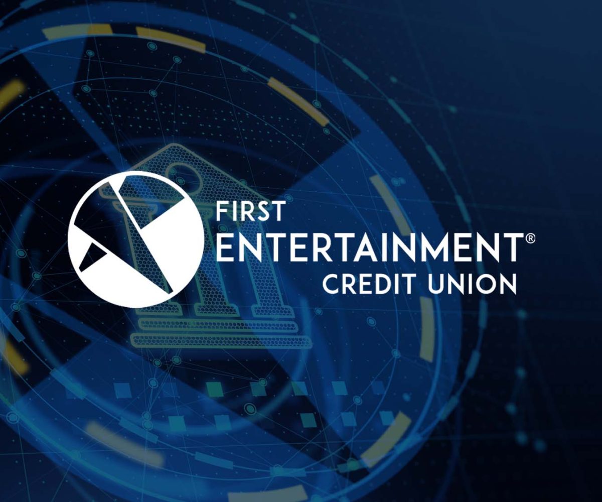 Sleek black sports car being polished in a workshop setting. Ideal for creative and business use